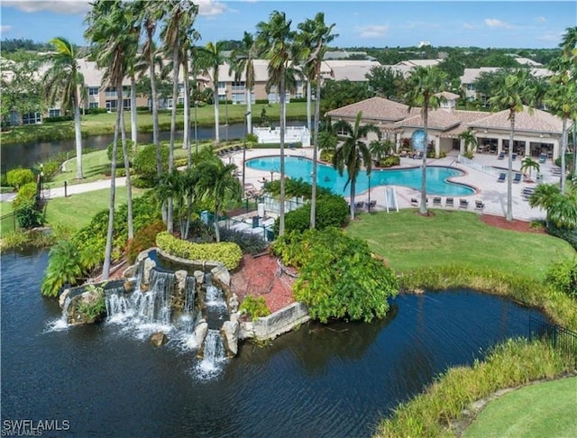 birds eye view of property featuring a water view