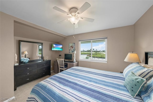 bedroom featuring lofted ceiling and ceiling fan