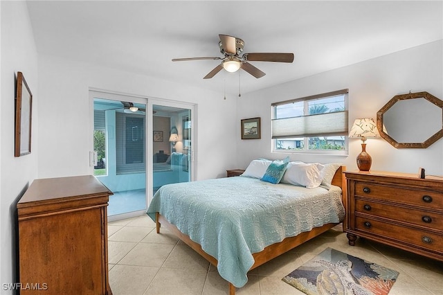 tiled bedroom with access to exterior and ceiling fan