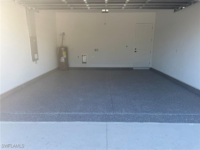 garage with water heater and baseboards