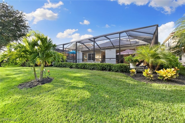 view of yard featuring glass enclosure