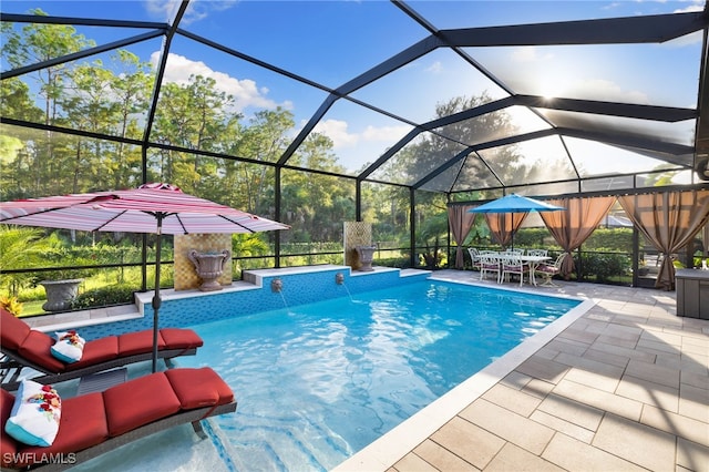 pool with a lanai and a patio