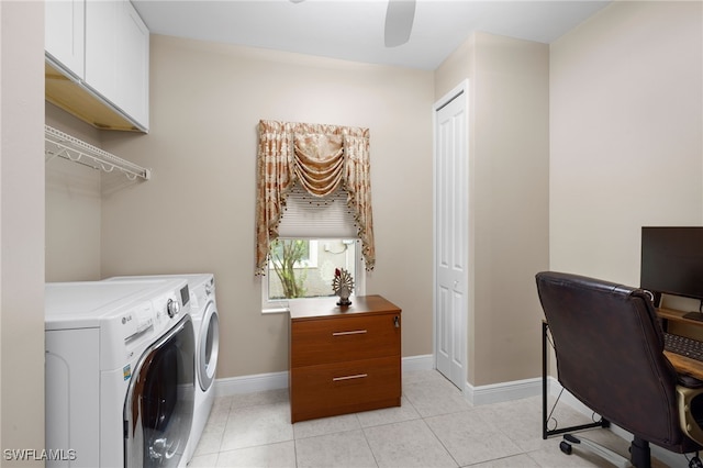 laundry area with light tile patterned floors, cabinet space, a ceiling fan, washing machine and dryer, and baseboards