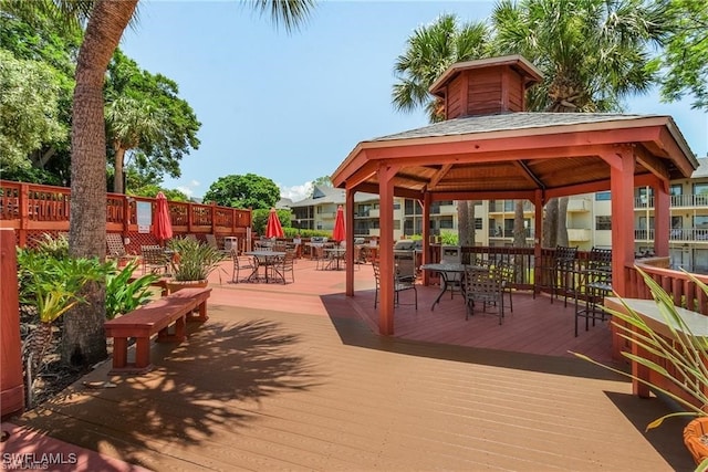 wooden terrace with a gazebo