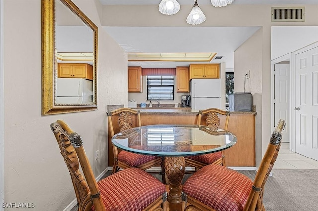 view of tiled dining space