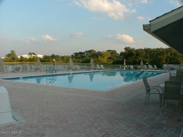 view of pool featuring a patio area