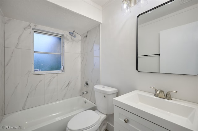 full bathroom with toilet, vanity, and tiled shower / bath