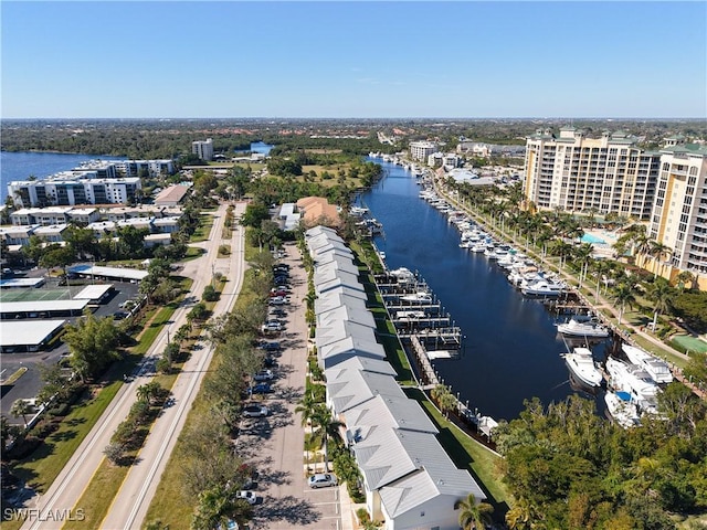 birds eye view of property featuring a water view