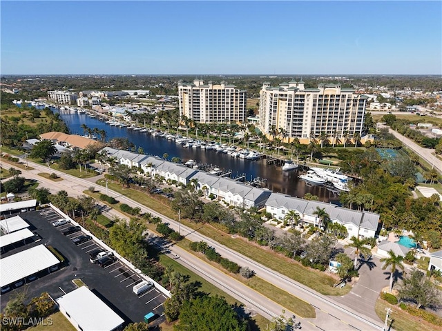 birds eye view of property featuring a water view