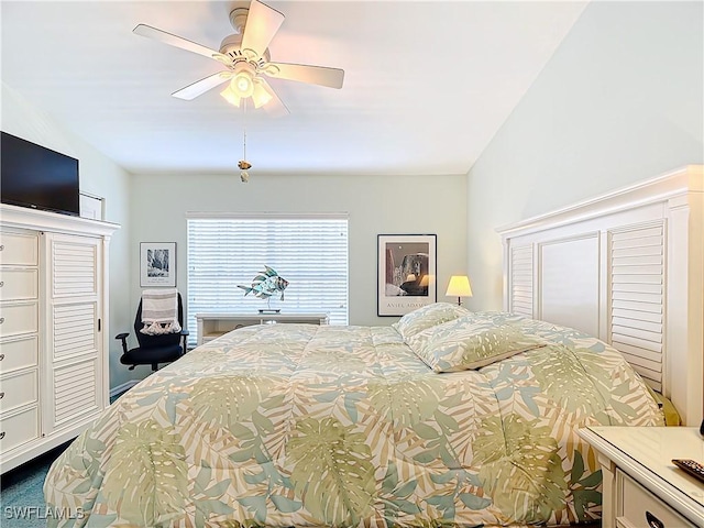 bedroom featuring ceiling fan and carpet floors