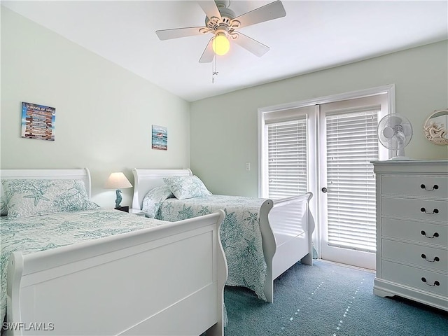 bedroom featuring dark carpet and ceiling fan