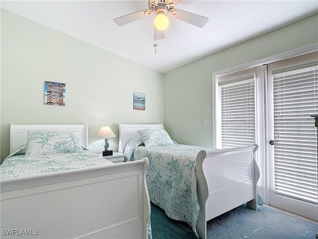 carpeted bedroom featuring ceiling fan