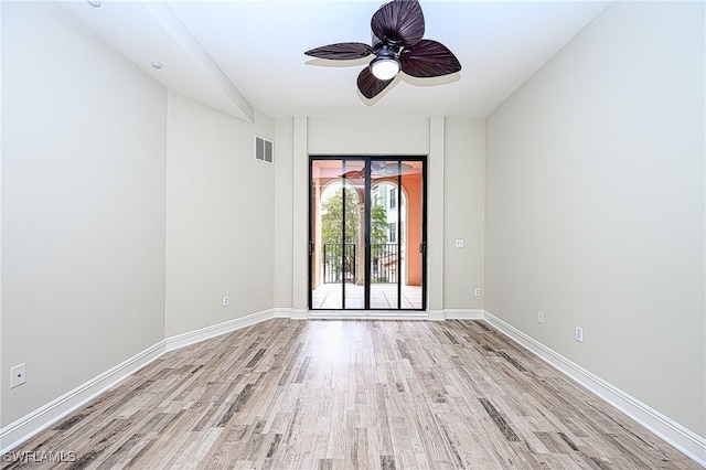 unfurnished room with light hardwood / wood-style flooring and ceiling fan