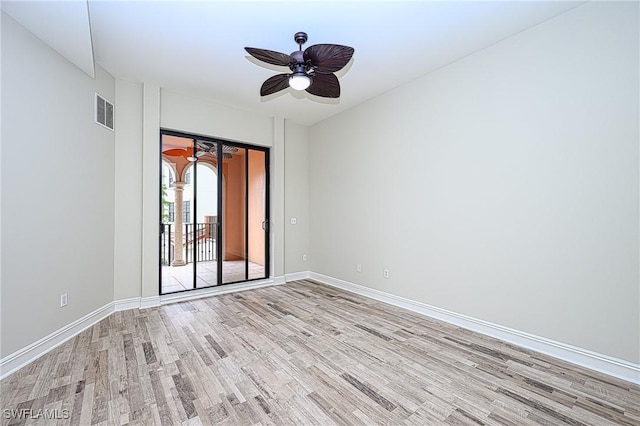 unfurnished room with ceiling fan and light hardwood / wood-style flooring