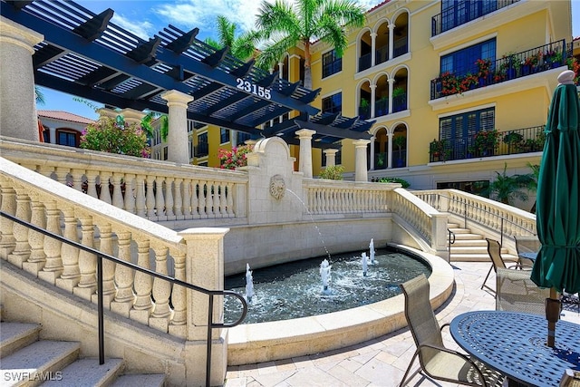 view of pool featuring a pergola