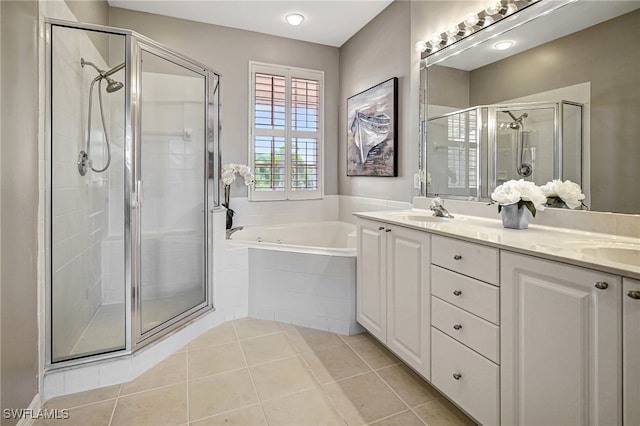 bathroom featuring vanity, separate shower and tub, and tile patterned floors