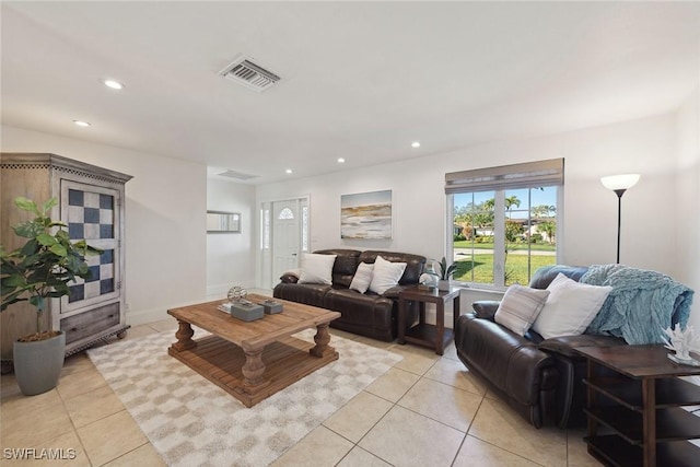 living room with light tile patterned floors