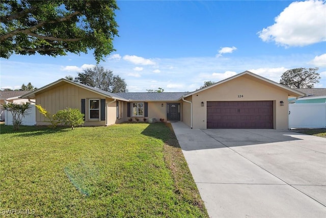 ranch-style house featuring a garage and a front yard