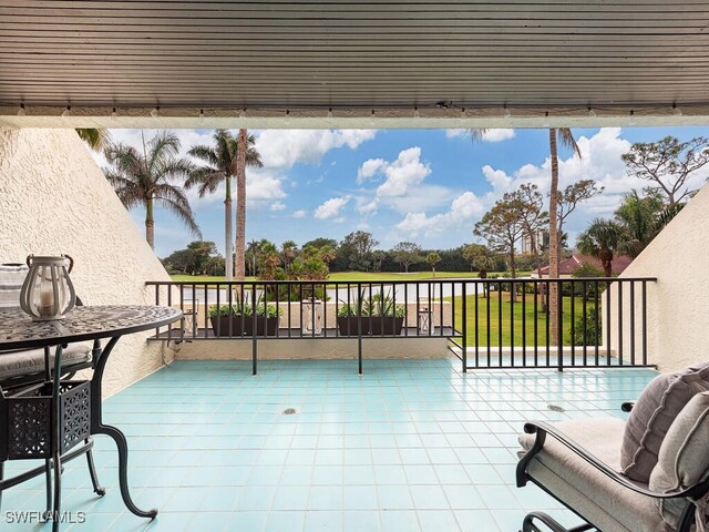 view of patio / terrace with a balcony