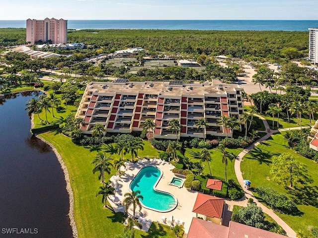 drone / aerial view with a water view