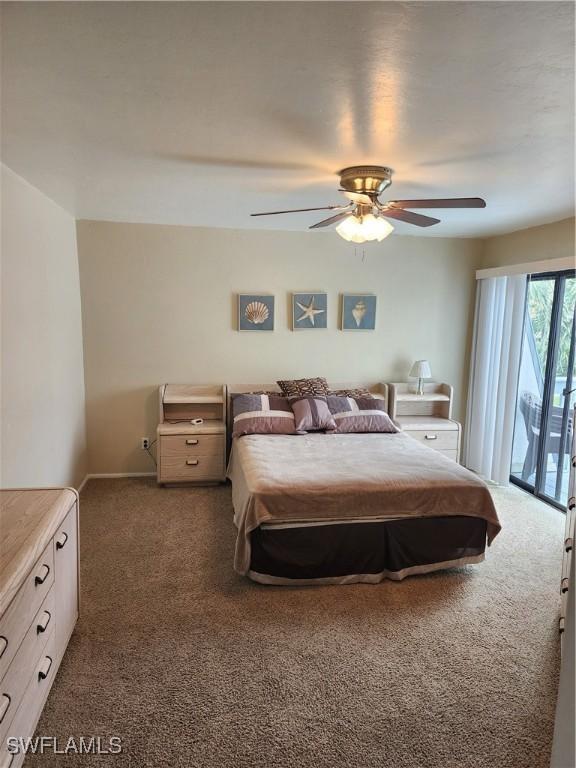 carpeted bedroom featuring ceiling fan and access to outside