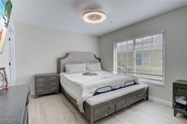 bedroom with light hardwood / wood-style floors