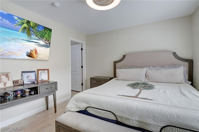 bedroom with light wood-type flooring