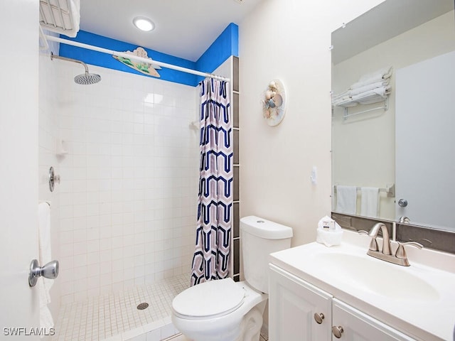 bathroom with vanity, a shower with curtain, and toilet