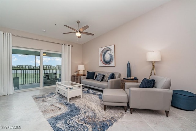 living room with light tile patterned flooring and ceiling fan