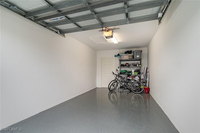 garage featuring a garage door opener