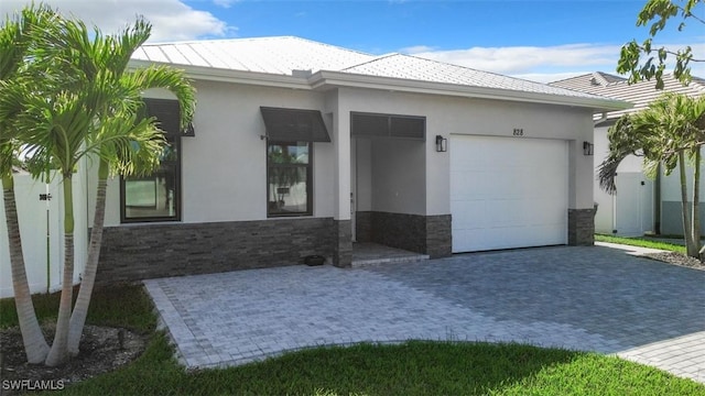 view of front of home with a garage