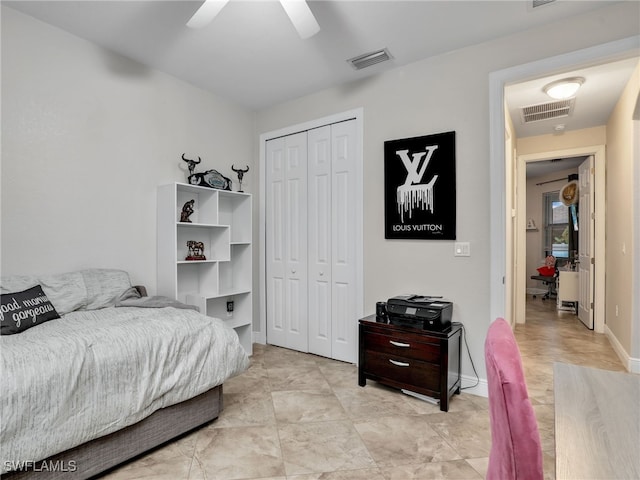 bedroom featuring a closet and ceiling fan