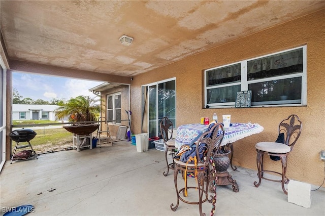 view of patio / terrace with a grill