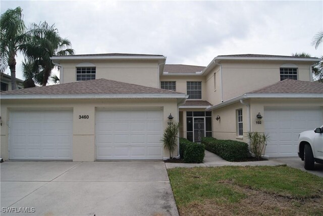 view of front of home with a garage