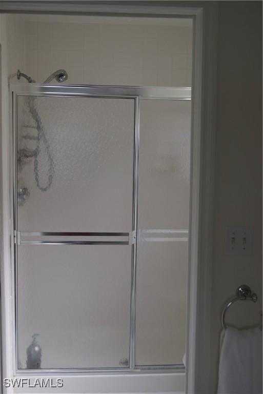 bathroom with an enclosed shower