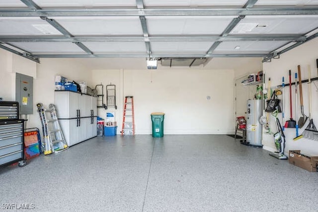 garage with electric panel, water heater, and a garage door opener