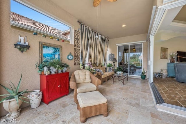 view of patio / terrace featuring ceiling fan