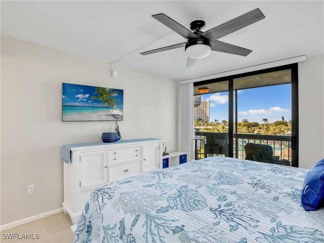 carpeted bedroom with access to exterior and ceiling fan