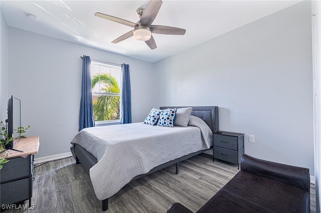 bedroom featuring hardwood / wood-style flooring and ceiling fan