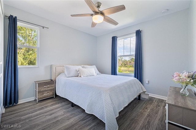 bedroom featuring dark hardwood / wood-style floors and ceiling fan