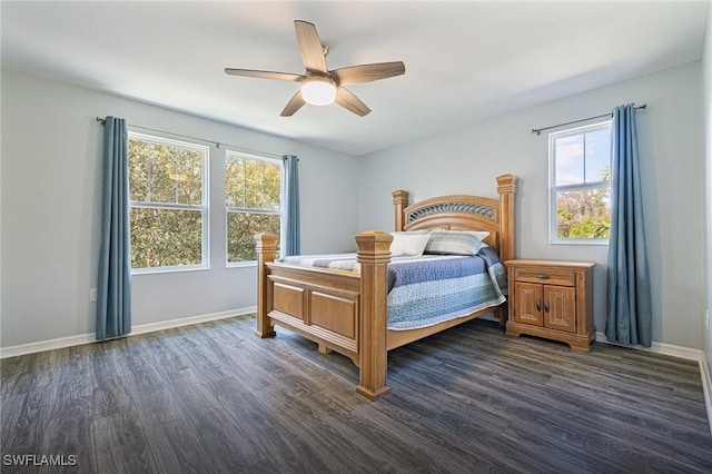 bedroom with dark wood-type flooring and ceiling fan