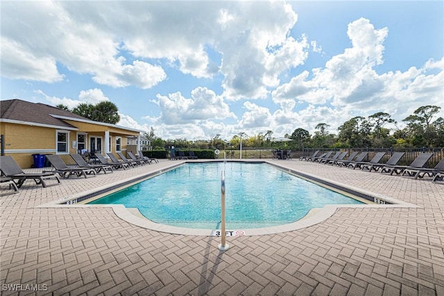 view of pool featuring a patio area