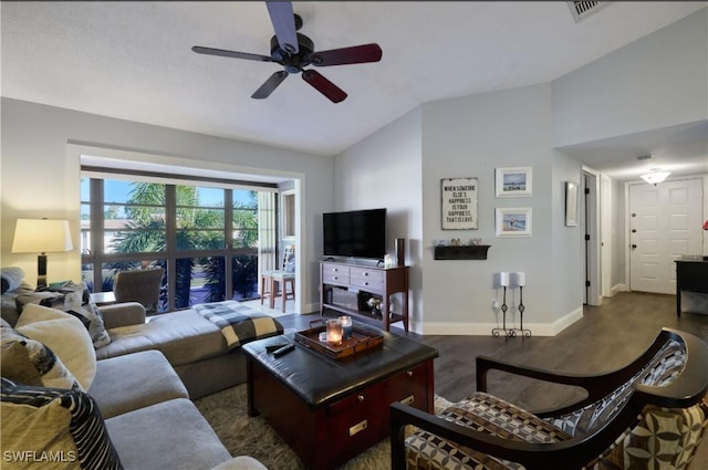 living room with vaulted ceiling, dark hardwood / wood-style floors, and ceiling fan