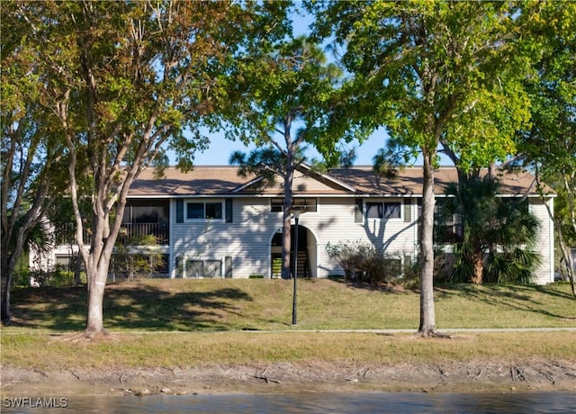 view of front of home with a front yard