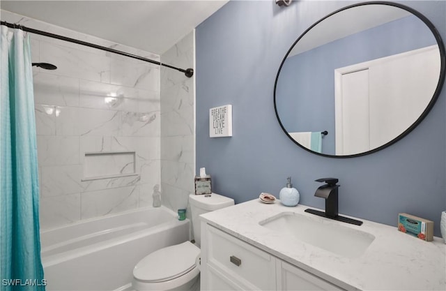 full bathroom featuring vanity, shower / tub combo with curtain, and toilet