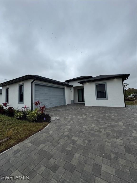 view of front of property featuring a garage