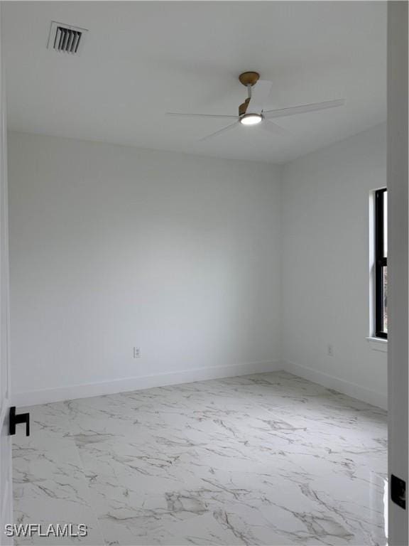 unfurnished room featuring ceiling fan