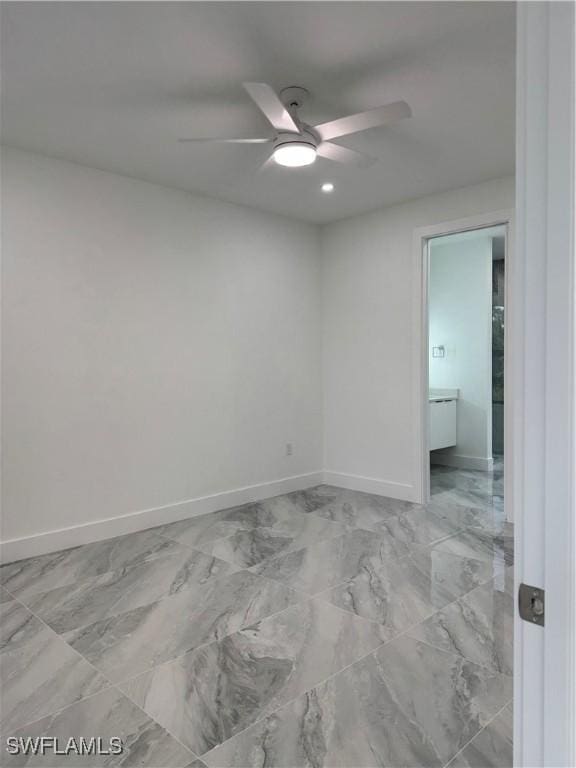 spare room featuring ceiling fan