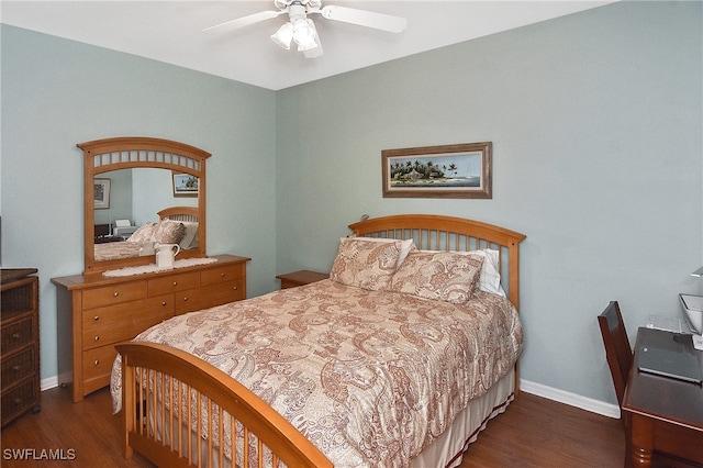 bedroom with ceiling fan and dark hardwood / wood-style flooring