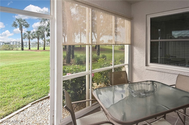 sunroom with plenty of natural light